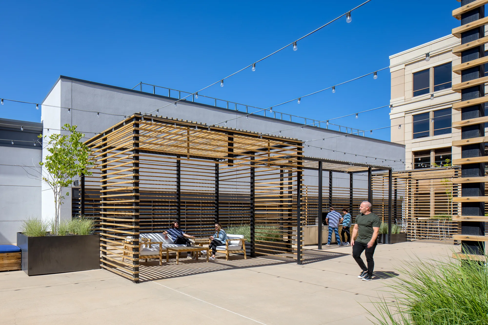 STAND-IN BRANDON TO VET — Hidden Gem deck with planter backdrop