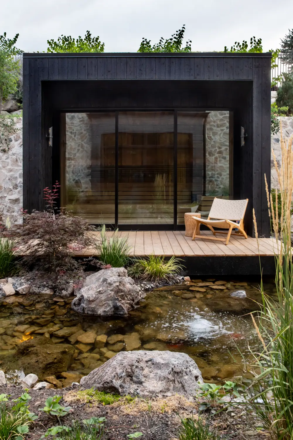 Modern Elm, garden pavilion over the koi pond
