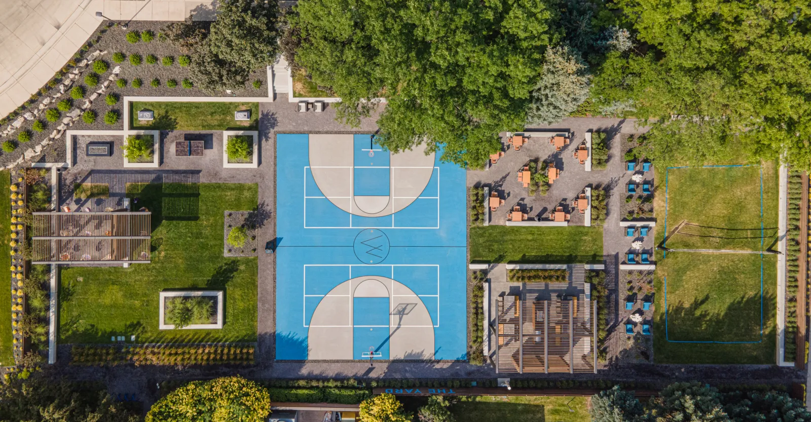 STAND-IN BRANDON TO VET — The Yard panoramic aerial (8K master, the marquee shot)